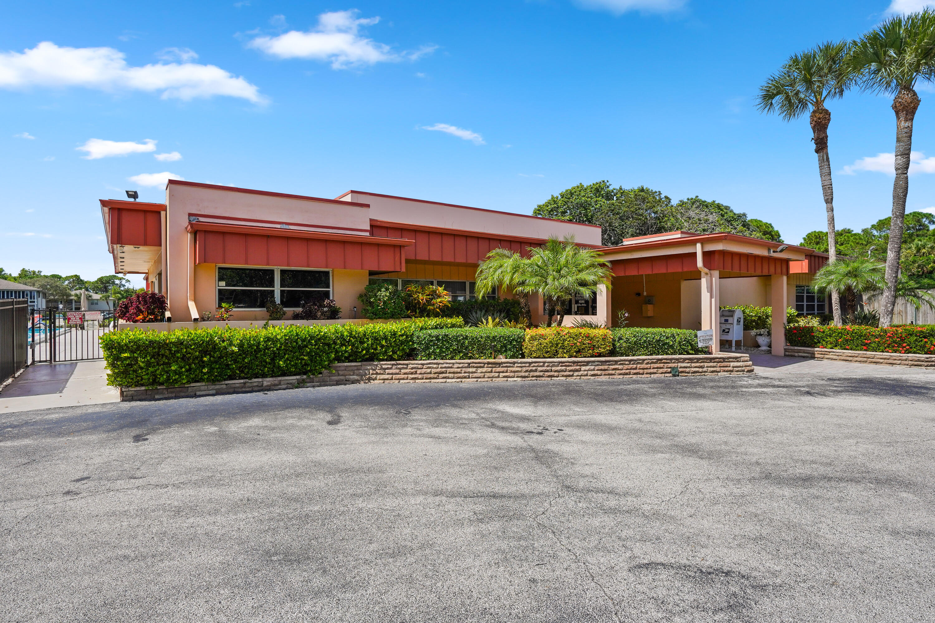 23 Lake Vista Trail, Unit 101 Port St. Lucie, FL 34952 - Photo 23 of 24 front view of a building with a street