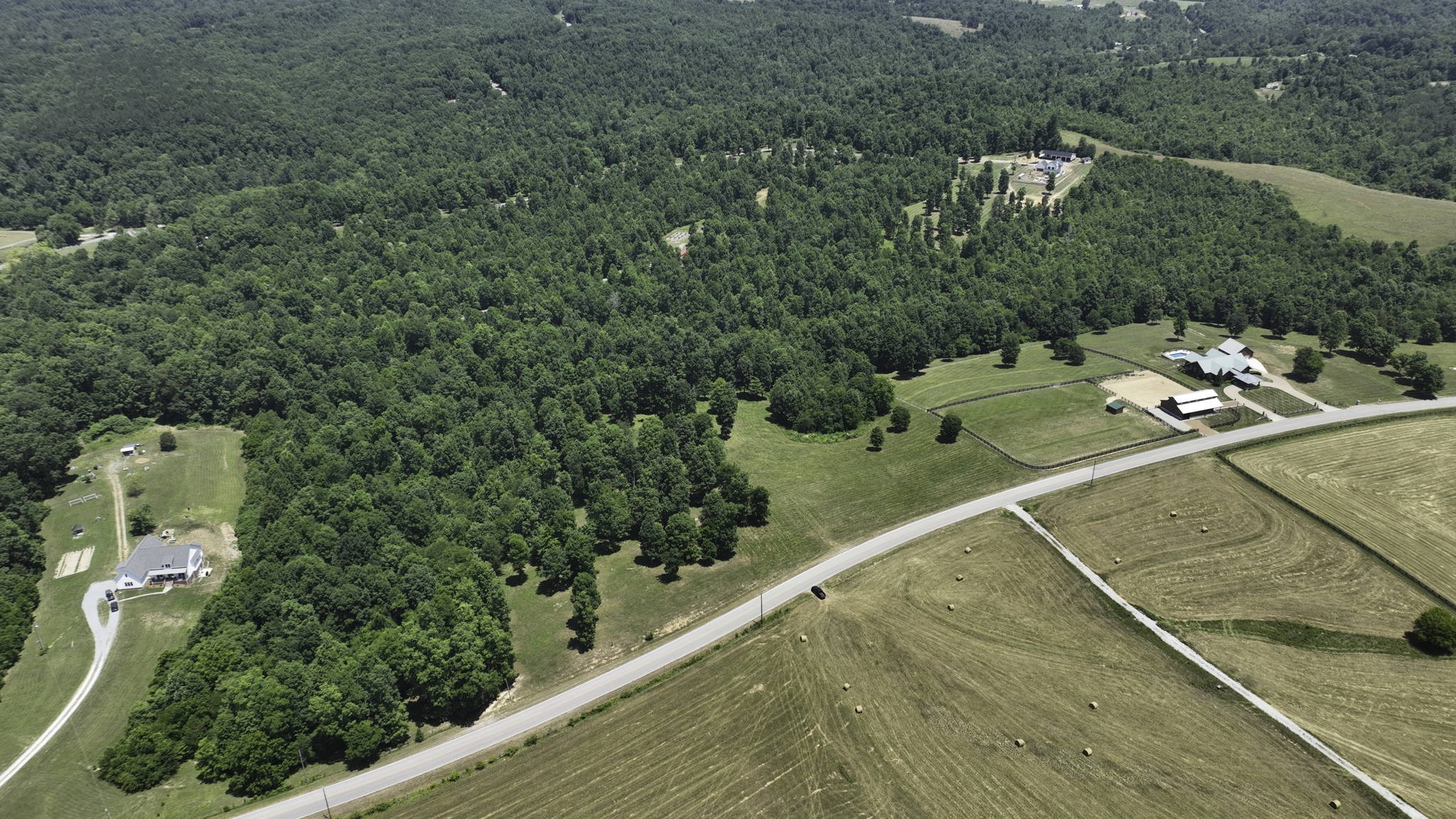 7840 West Lick Creek Road Primm Springs, TN 38476 - Photo 14 of 20 a view of a balcony with chairs