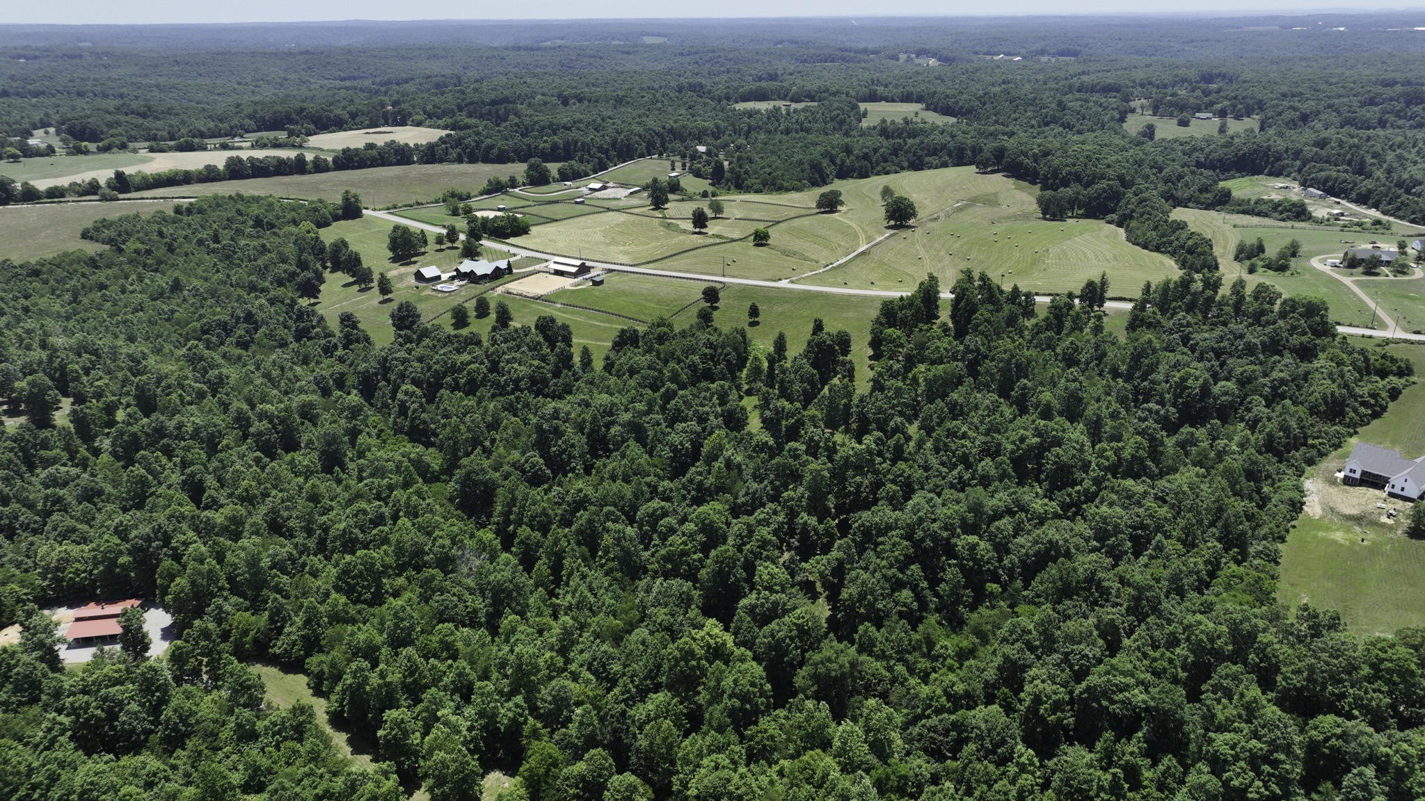 7840 West Lick Creek Road Primm Springs, TN 38476 - Photo 16 of 20 an aerial view of a house with a yard