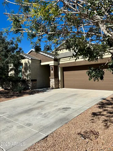 front view of a house with a street