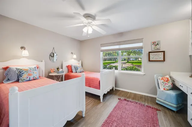 a bed room with a bed and a window