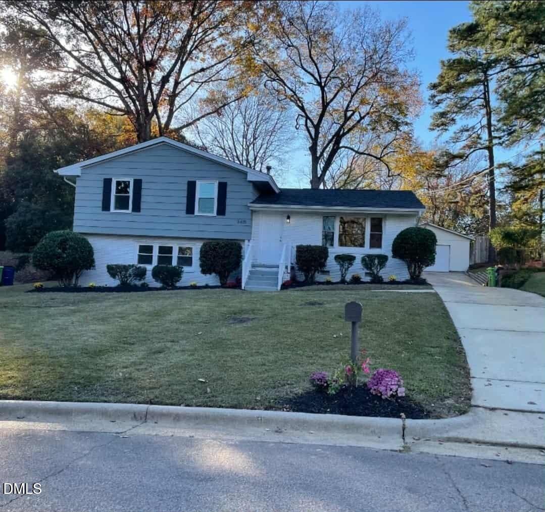 3415 Carolyn Drive Raleigh, NC 27604 - Photo 1 of 30 a front view of a house with a garden