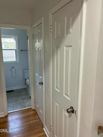 a view of a bathroom from the hallway