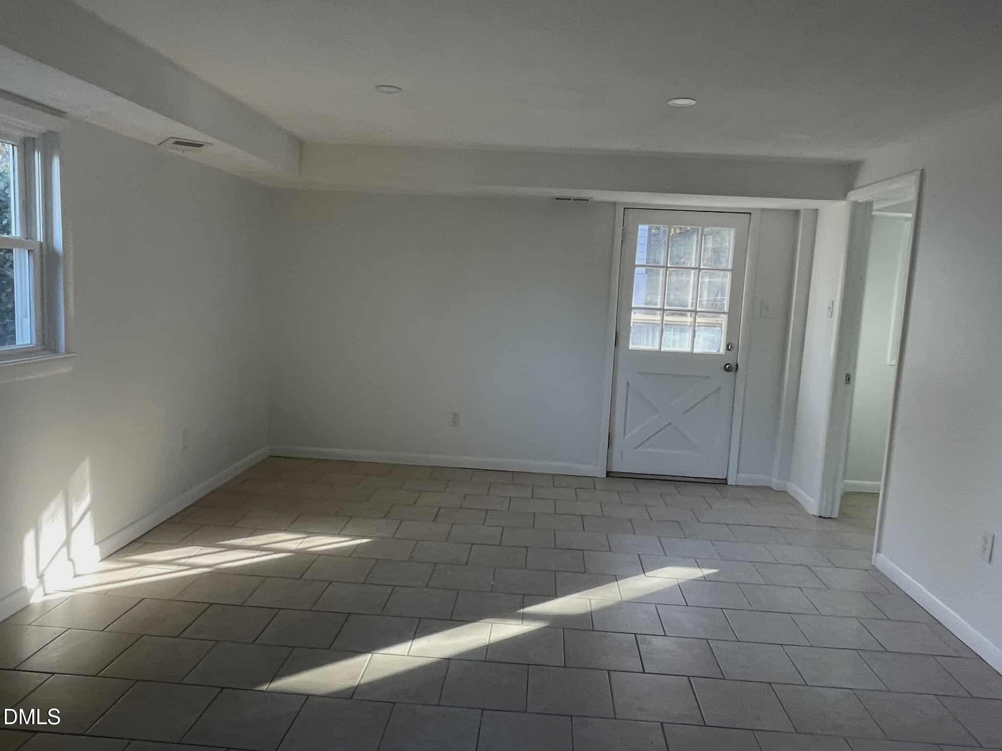 3415 Carolyn Drive Raleigh, NC 27604 - Photo 23 of 30 a view of an empty room and window