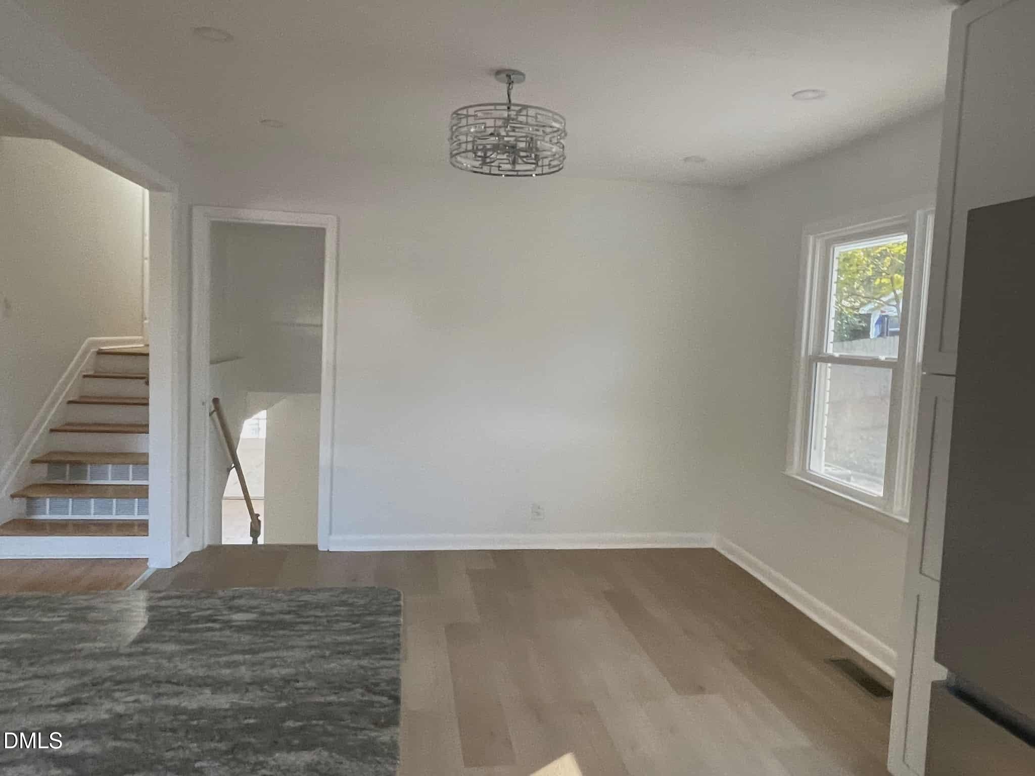 3415 Carolyn Drive Raleigh, NC 27604 - Photo 7 of 30 a view of a room that has a window