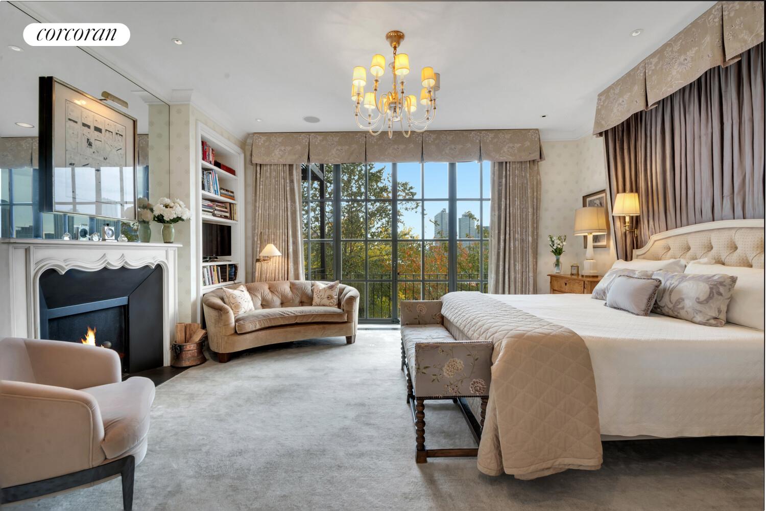 7 Beekman Place, Unit 14 Manhattan, NY 10022 - Photo 8 of 21 a bedroom with a bed couch and large windows