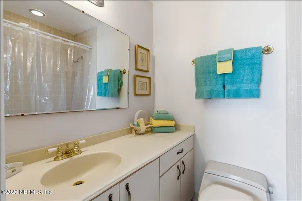 a aerial view of a house with swimming pool garden and patio