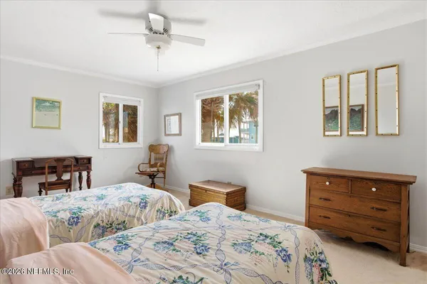 a view of a house with swimming pool and a yard