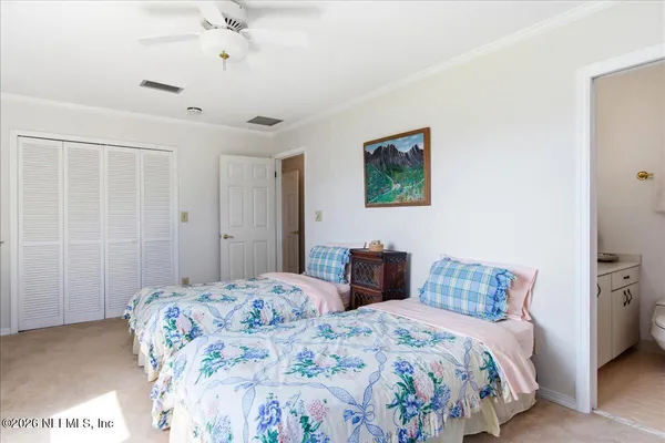 a view of a river and mountains in the background