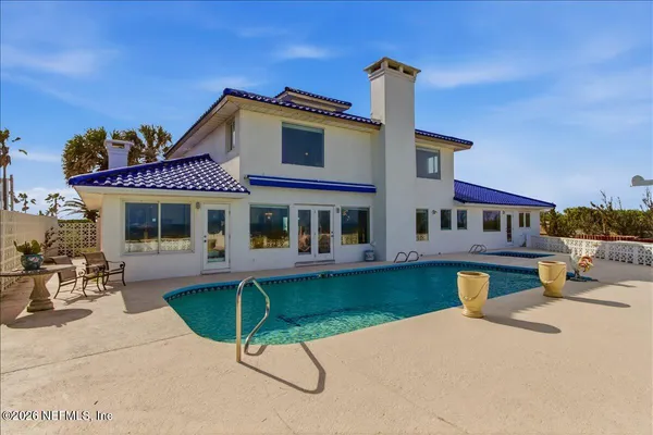 an aerial view of residential building with outdoor space
