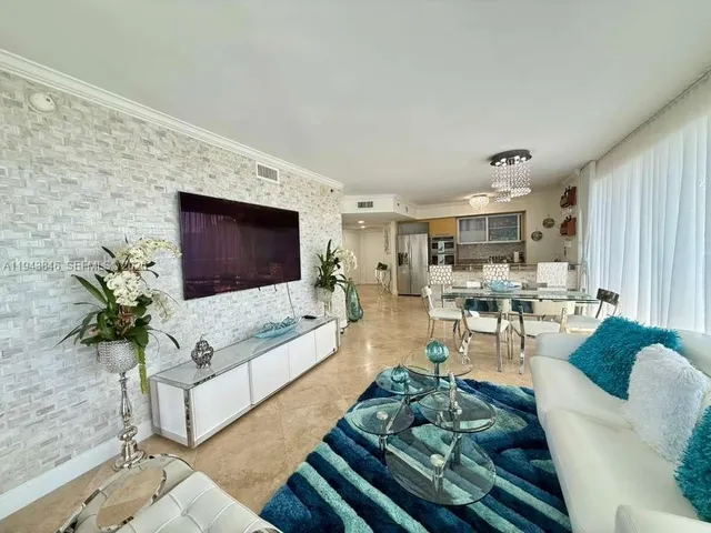 a bathroom with a toilet a sink and shower