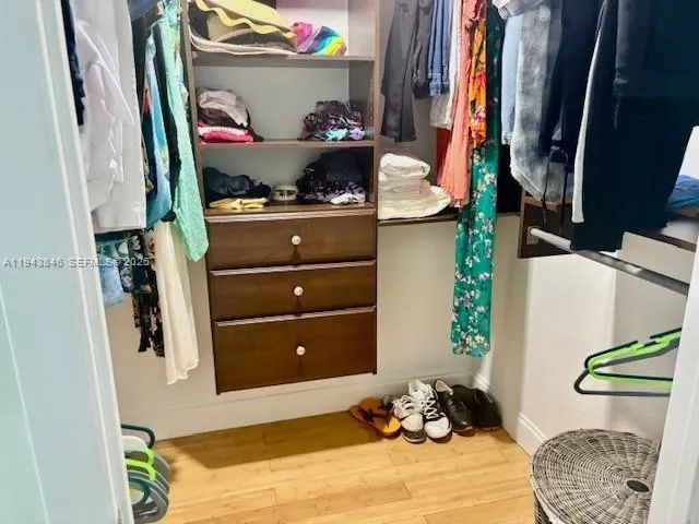 a view of a balcony with a yard