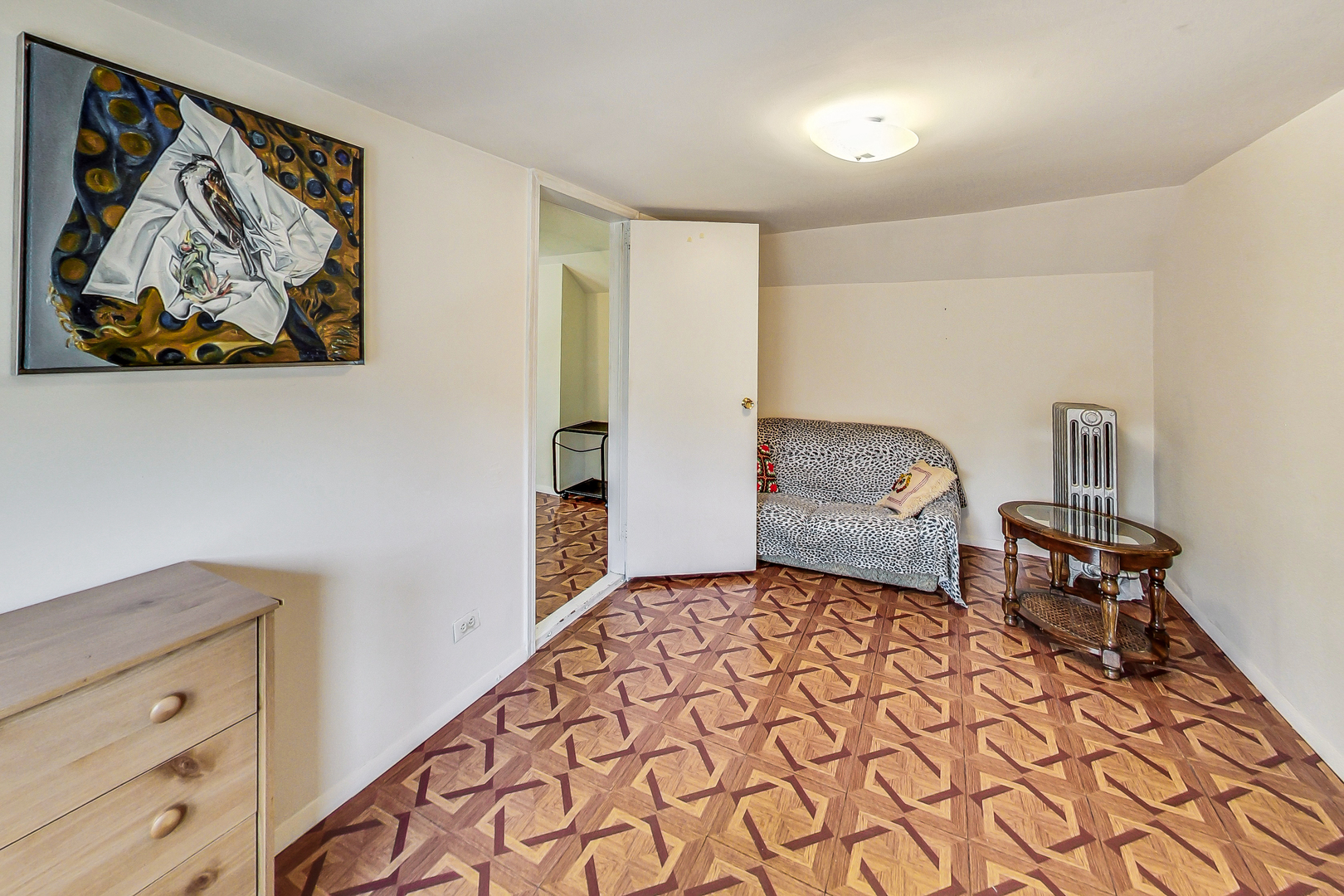 3025 North Rutherford Avenue Chicago, IL 60634 - Photo 24 of 46 a bedroom with a bed and a cabinets