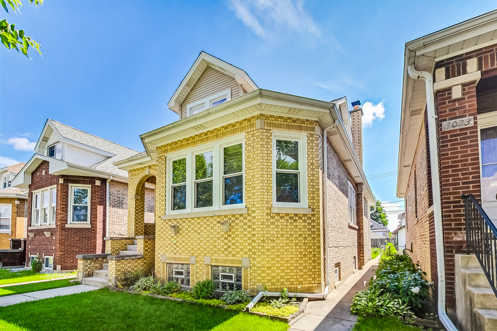 3025 North Rutherford Avenue Chicago, IL 60634 - Photo 3 of 46 front view of a house with a yard