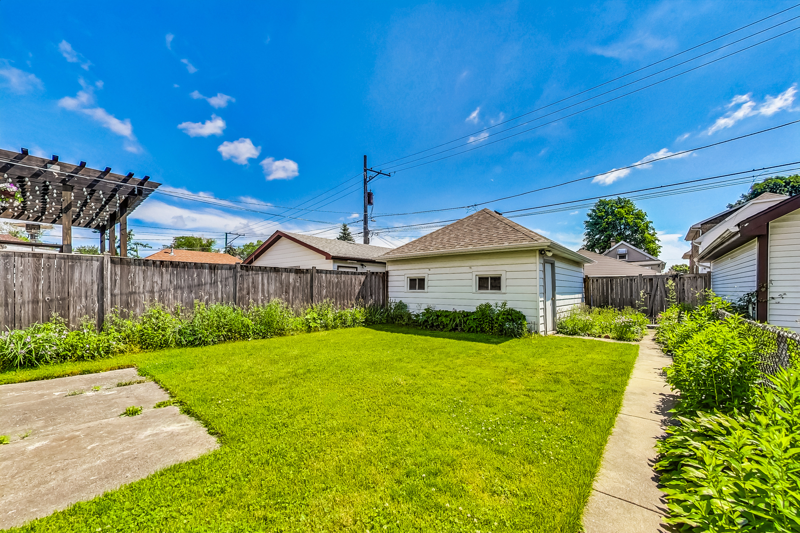 3025 North Rutherford Avenue Chicago, IL 60634 - Photo 42 of 46 a view of a house with a yard
