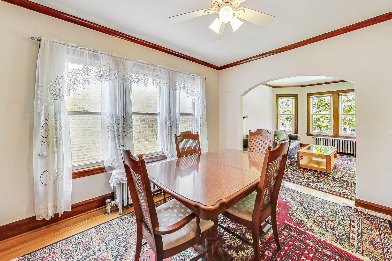 3025 North Rutherford Avenue Chicago, IL 60634 - Photo 8 of 46 a view of a dining room with furniture window and wooden floor