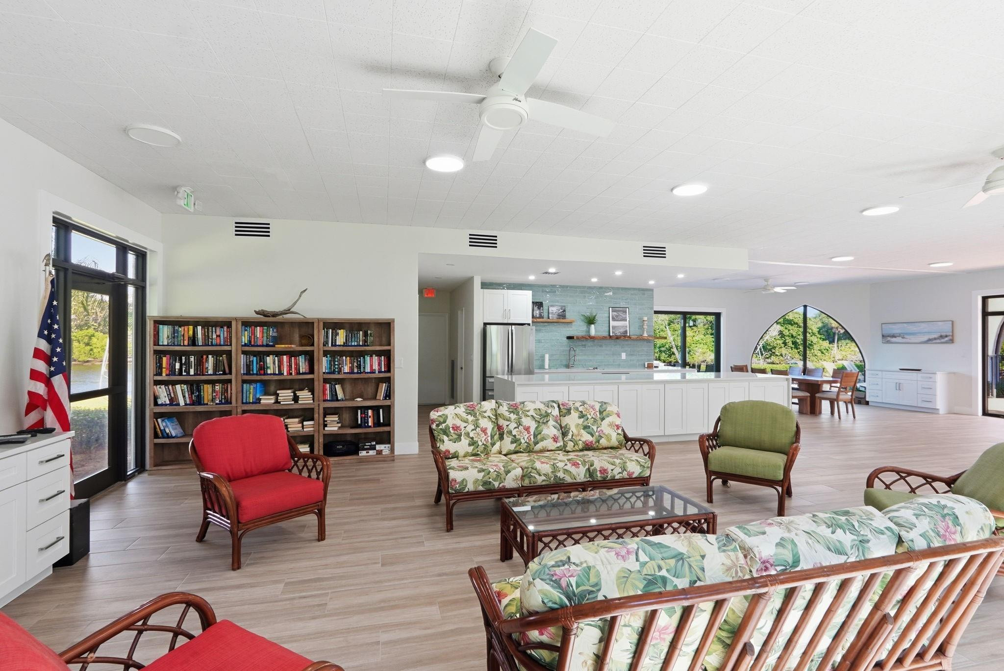 1629 Riverview Road, Unit 620 Deerfield Beach, FL 33441 - Photo 36 of 42 Clubhouse with kitchen area and seating
