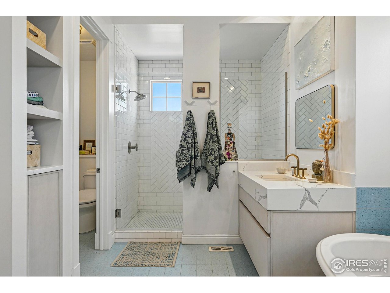 7531 Spring Drive Boulder, CO 80303 - Photo 18 of 35 a bathroom with a sink toilet and shower