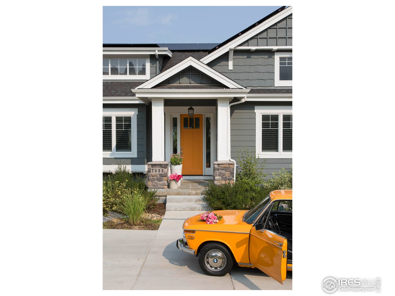 7531 Spring Drive Boulder, CO 80303 - Photo 2 of 35 a blue and white car parked in front of a house