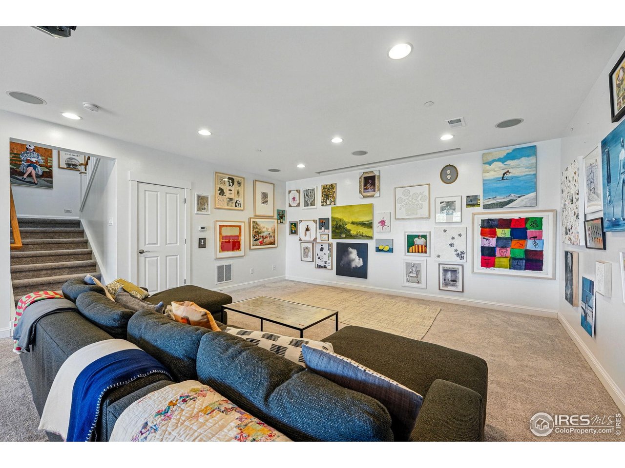 7531 Spring Drive Boulder, CO 80303 - Photo 23 of 35 a living room with furniture and a flat screen tv