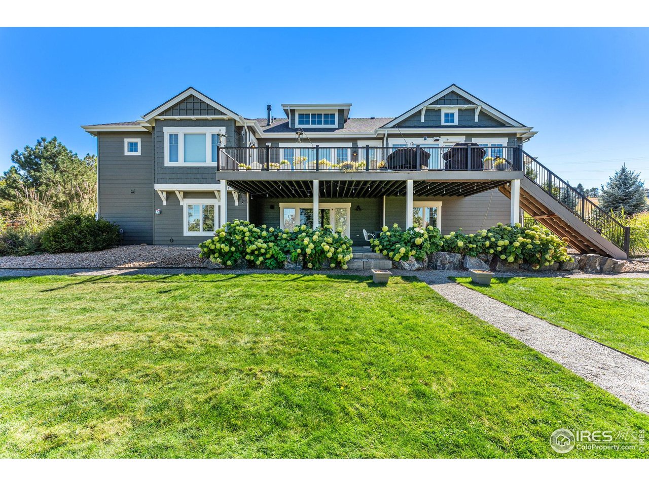 7531 Spring Drive Boulder, CO 80303 - Photo 33 of 35 a front view of a house with garden