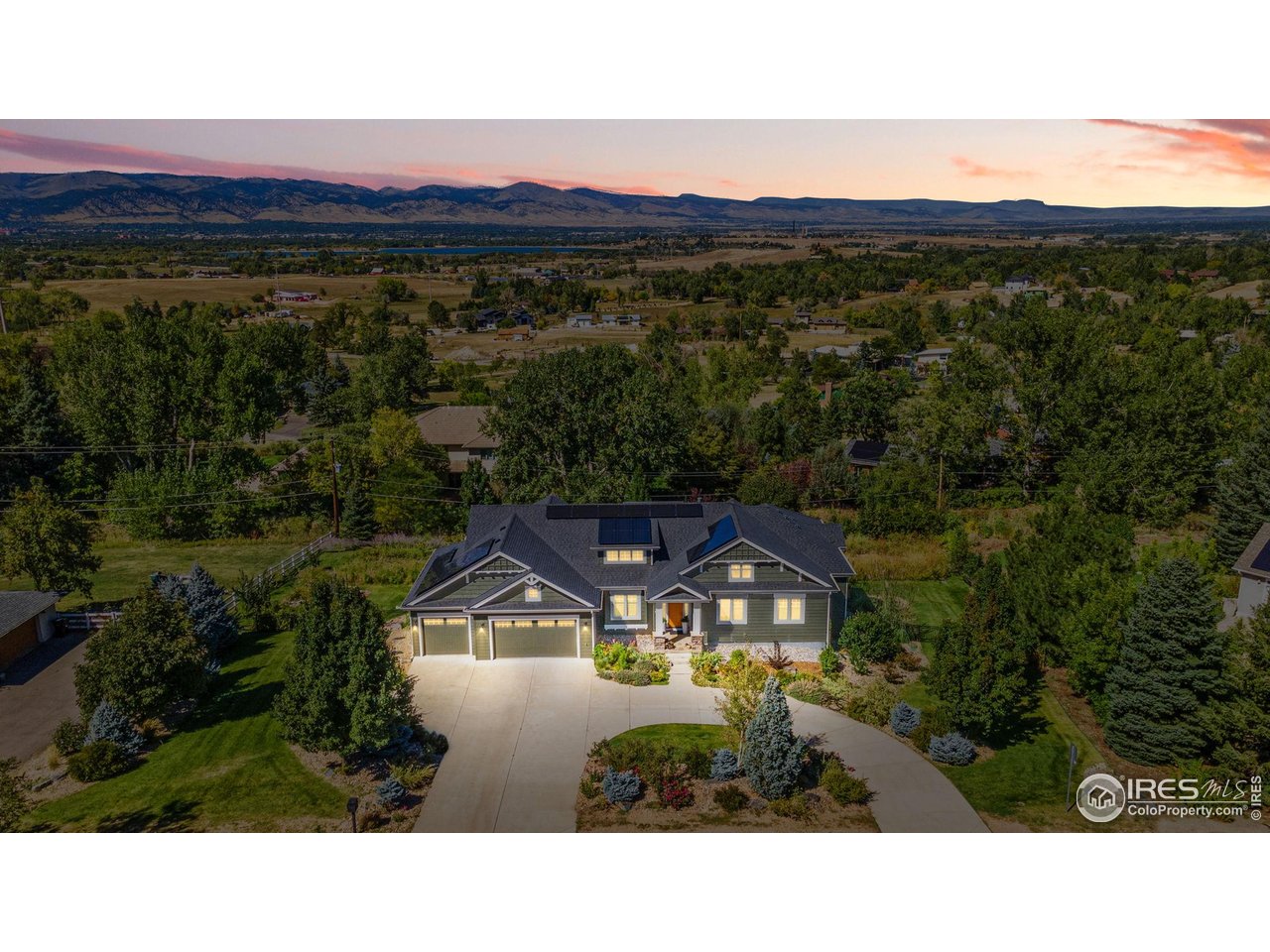 7531 Spring Drive Boulder, CO 80303 - Photo 34 of 35 a view of a big house with a big yard and large trees