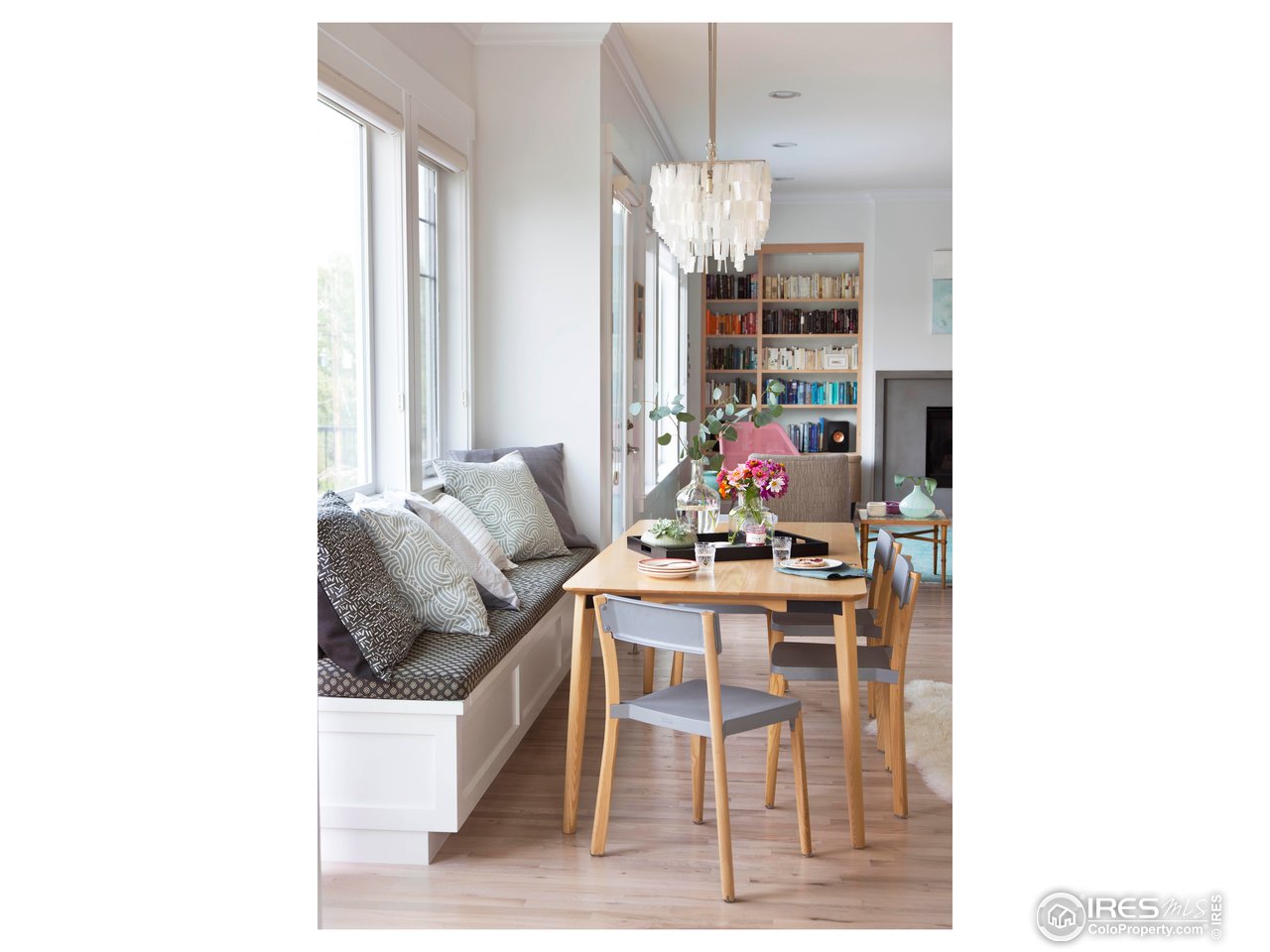 7531 Spring Drive Boulder, CO 80303 - Photo 10 of 35 a kitchen with stainless steel appliances kitchen island granite countertop a table and chairs in it