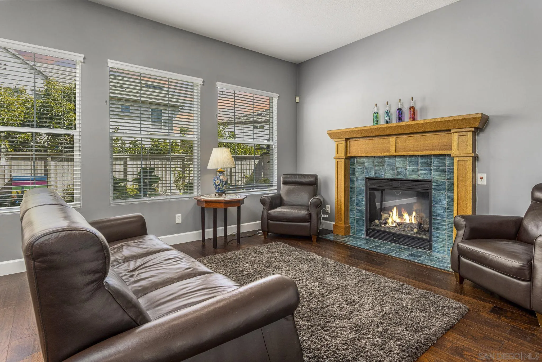 16778 Deer Ridge Road San Diego, CA 92127 - Photo 16 of 54 a living room with furniture and a fireplace