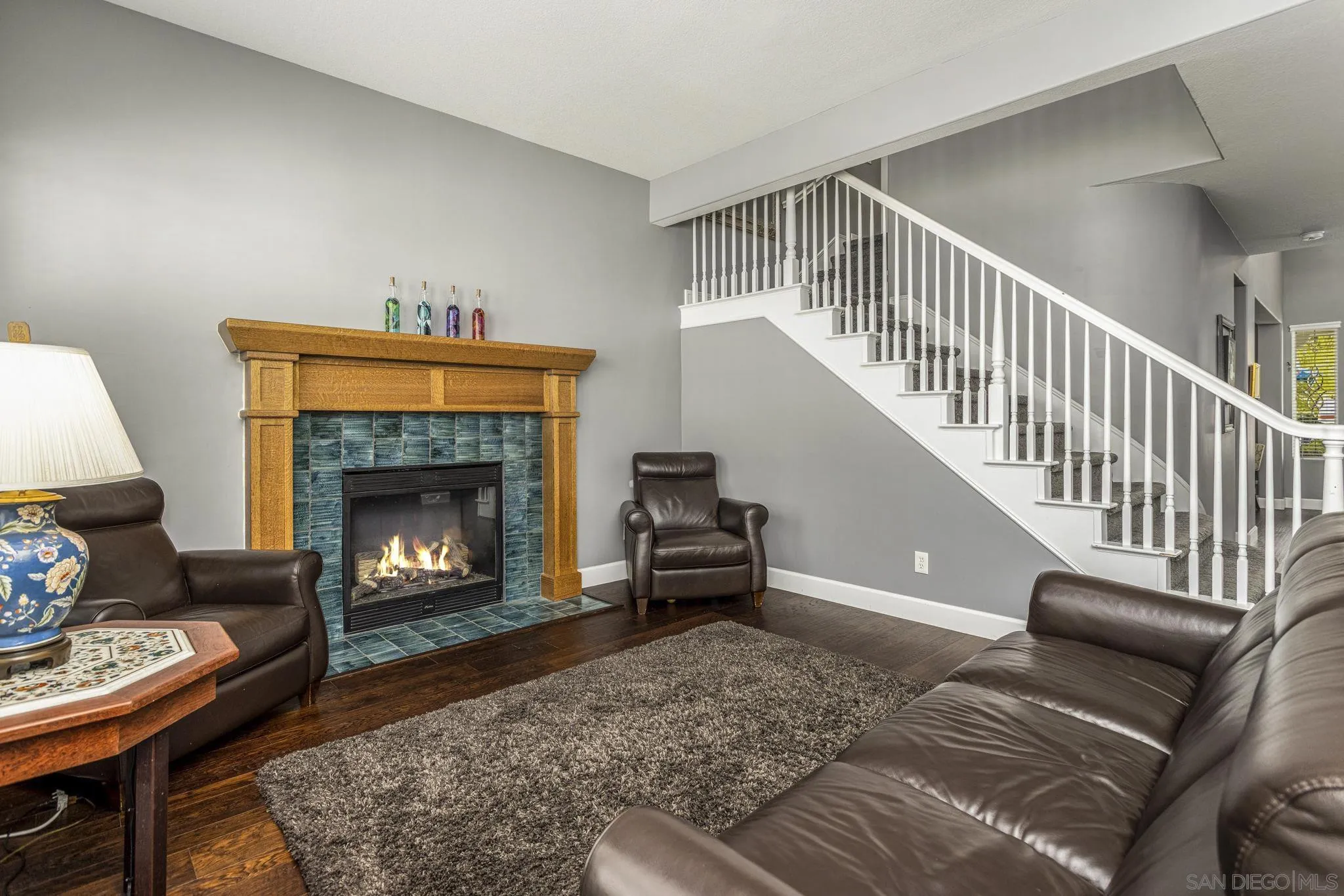 16778 Deer Ridge Road San Diego, CA 92127 - Photo 18 of 54 a living room with furniture and a fireplace