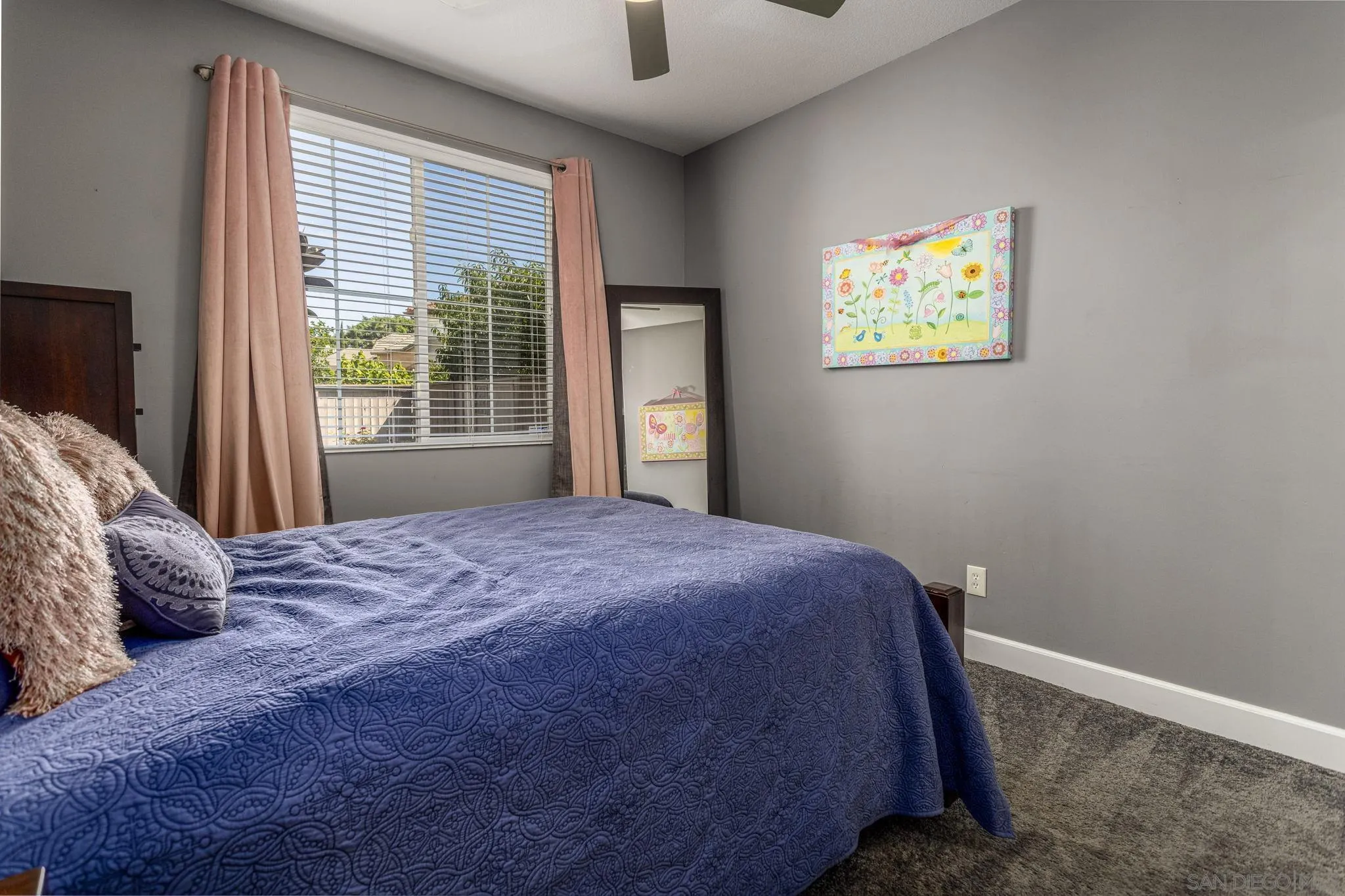 16778 Deer Ridge Road San Diego, CA 92127 - Photo 22 of 54 a bedroom with a bed and a window
