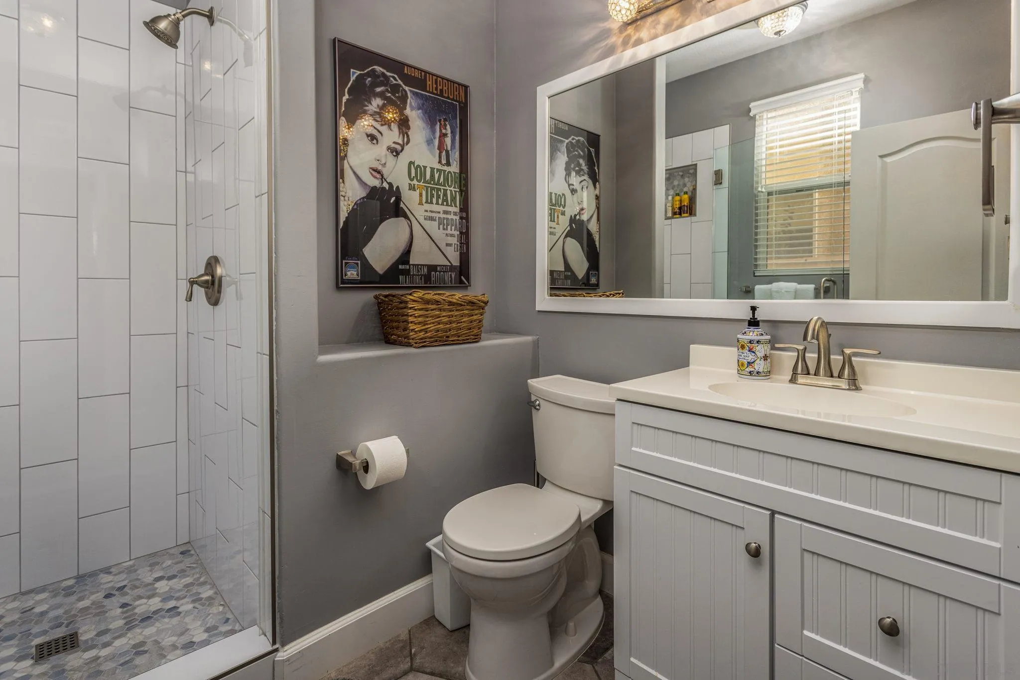 16778 Deer Ridge Road San Diego, CA 92127 - Photo 23 of 54 a bathroom with a toilet a sink and mirror