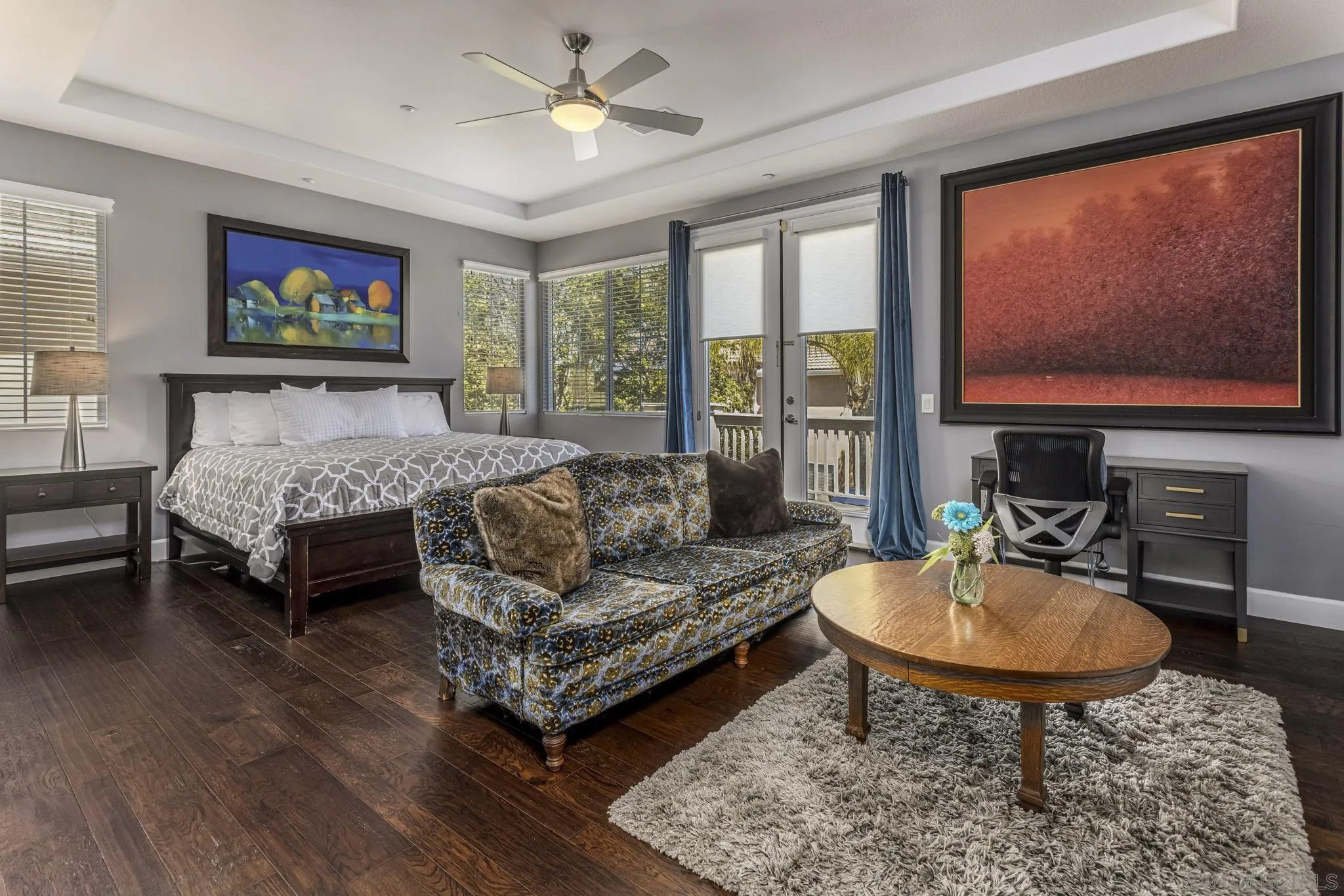 16778 Deer Ridge Road San Diego, CA 92127 - Photo 34 of 54 a living room with furniture a rug and a flat screen tv