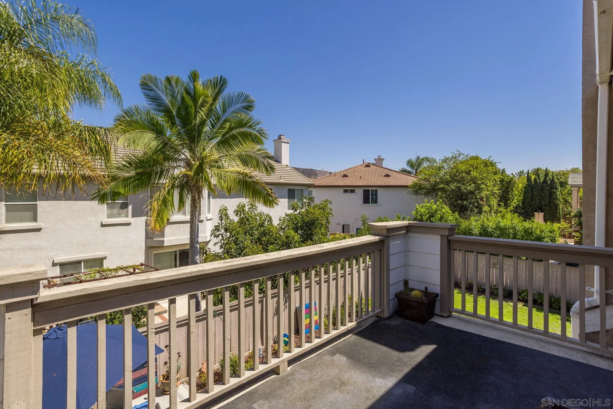 16778 Deer Ridge Road San Diego, CA 92127 - Photo 36 of 54 a view of a porch with a yard