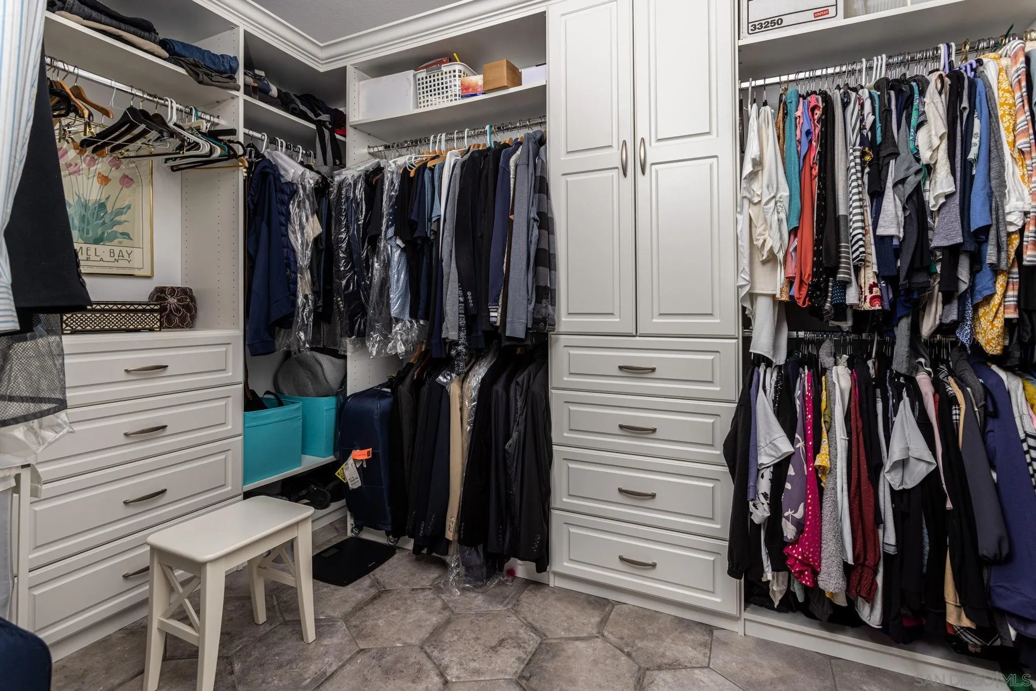 16778 Deer Ridge Road San Diego, CA 92127 - Photo 37 of 54 a view of walk in closet with clothes and shoes