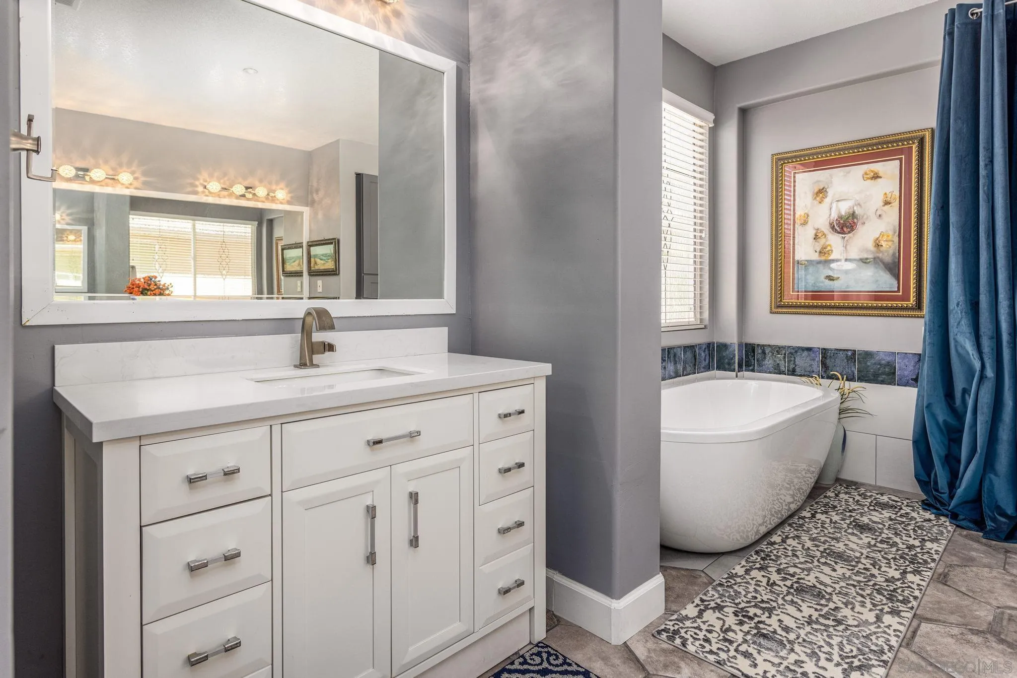 16778 Deer Ridge Road San Diego, CA 92127 - Photo 39 of 54 a spacious bathroom with double vanity a bathtub and a sink