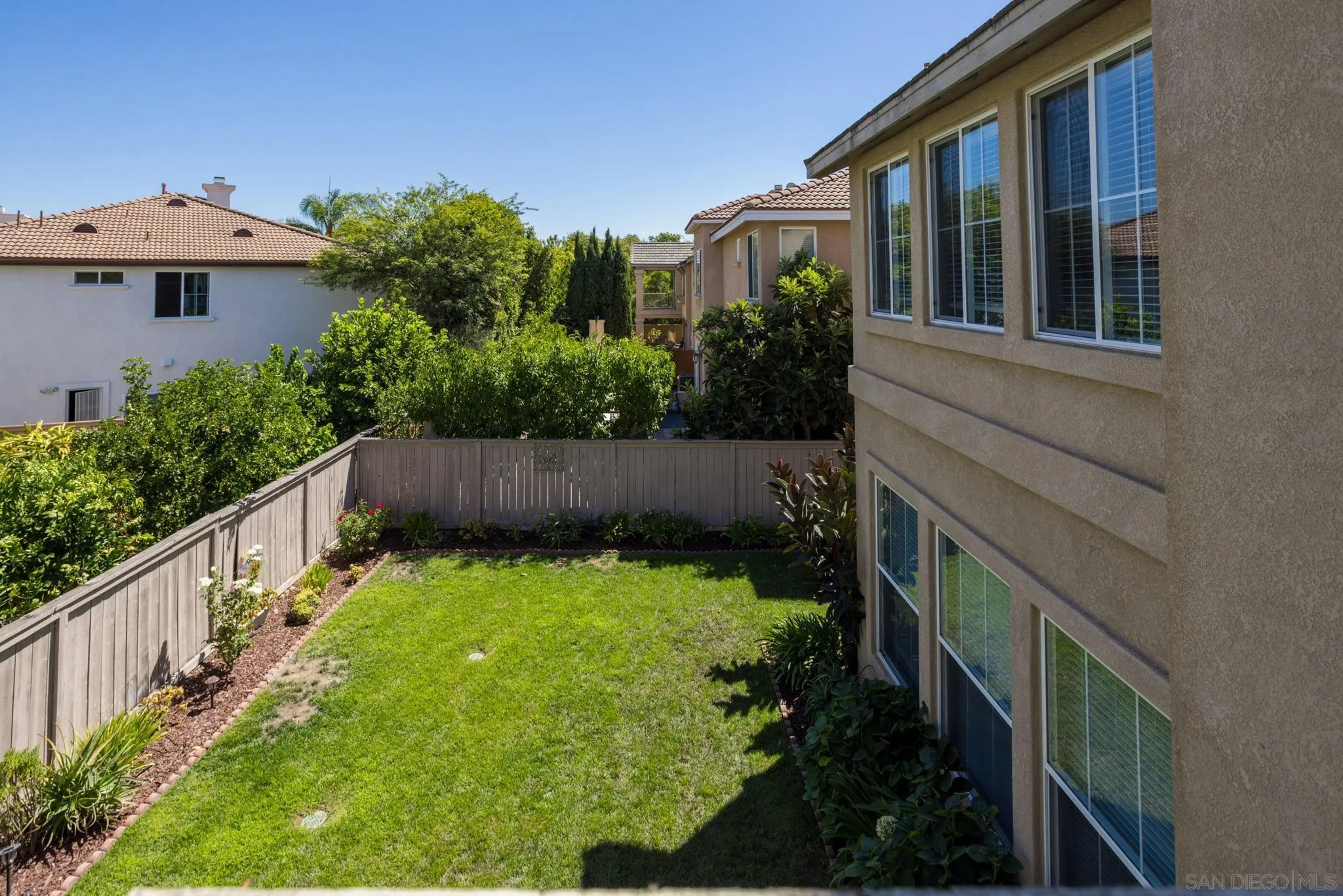 16778 Deer Ridge Road San Diego, CA 92127 - Photo 40 of 54 a view of house with backyard and garden