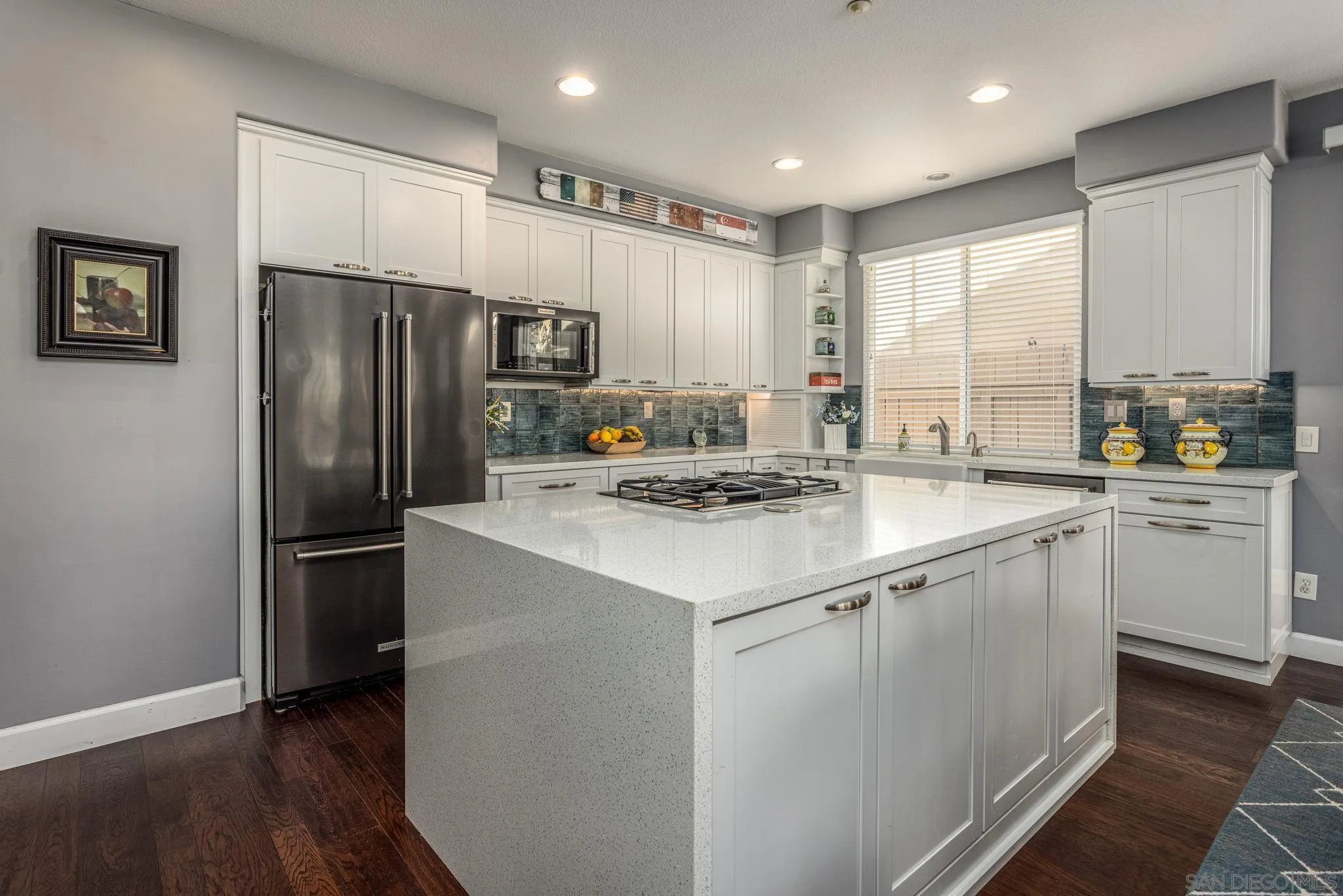 16778 Deer Ridge Road San Diego, CA 92127 - Photo 4 of 54 a kitchen with stainless steel appliances a refrigerator sink and cabinets