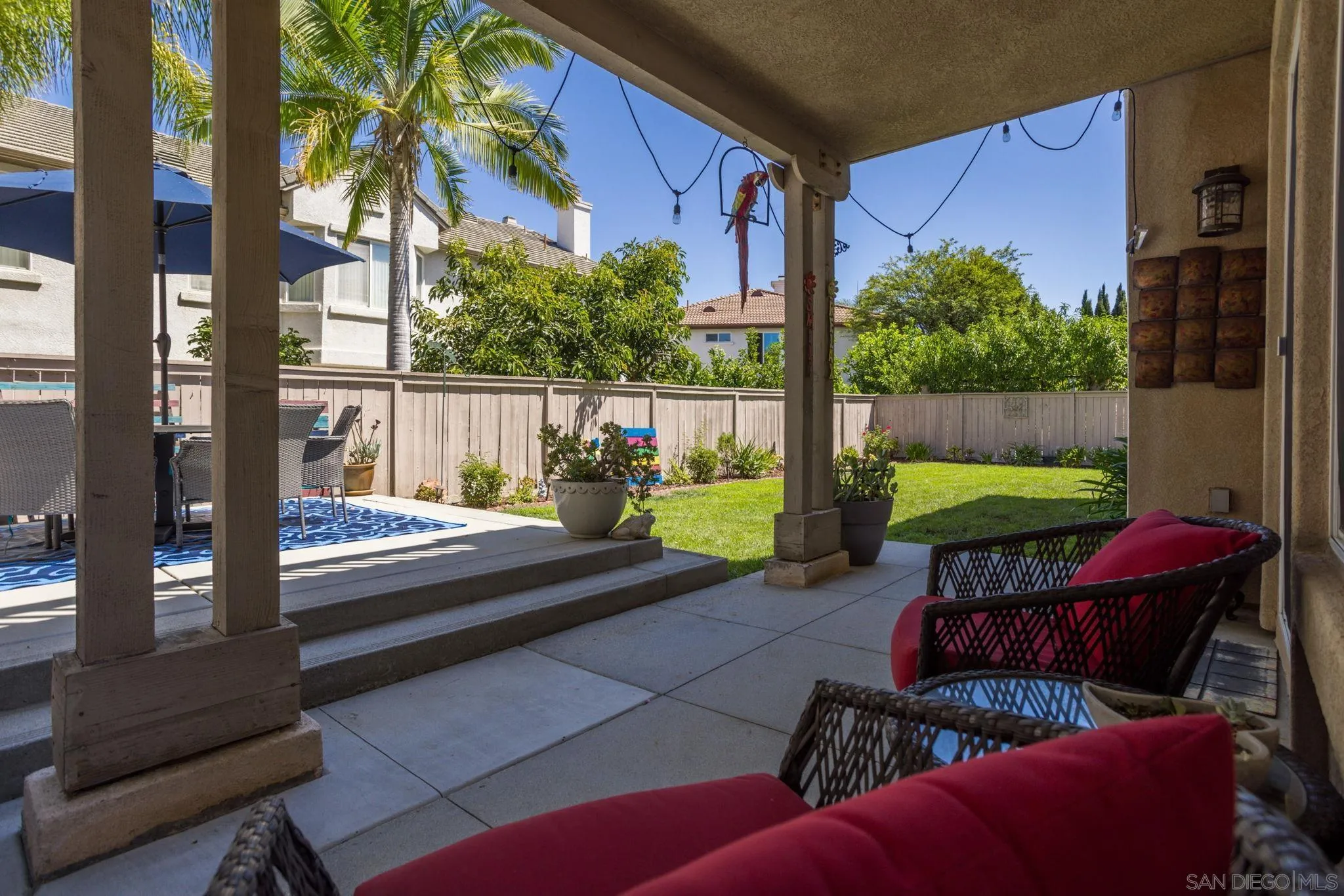 16778 Deer Ridge Road San Diego, CA 92127 - Photo 41 of 54 a view of balcony with a potted plant and outdoor seating
