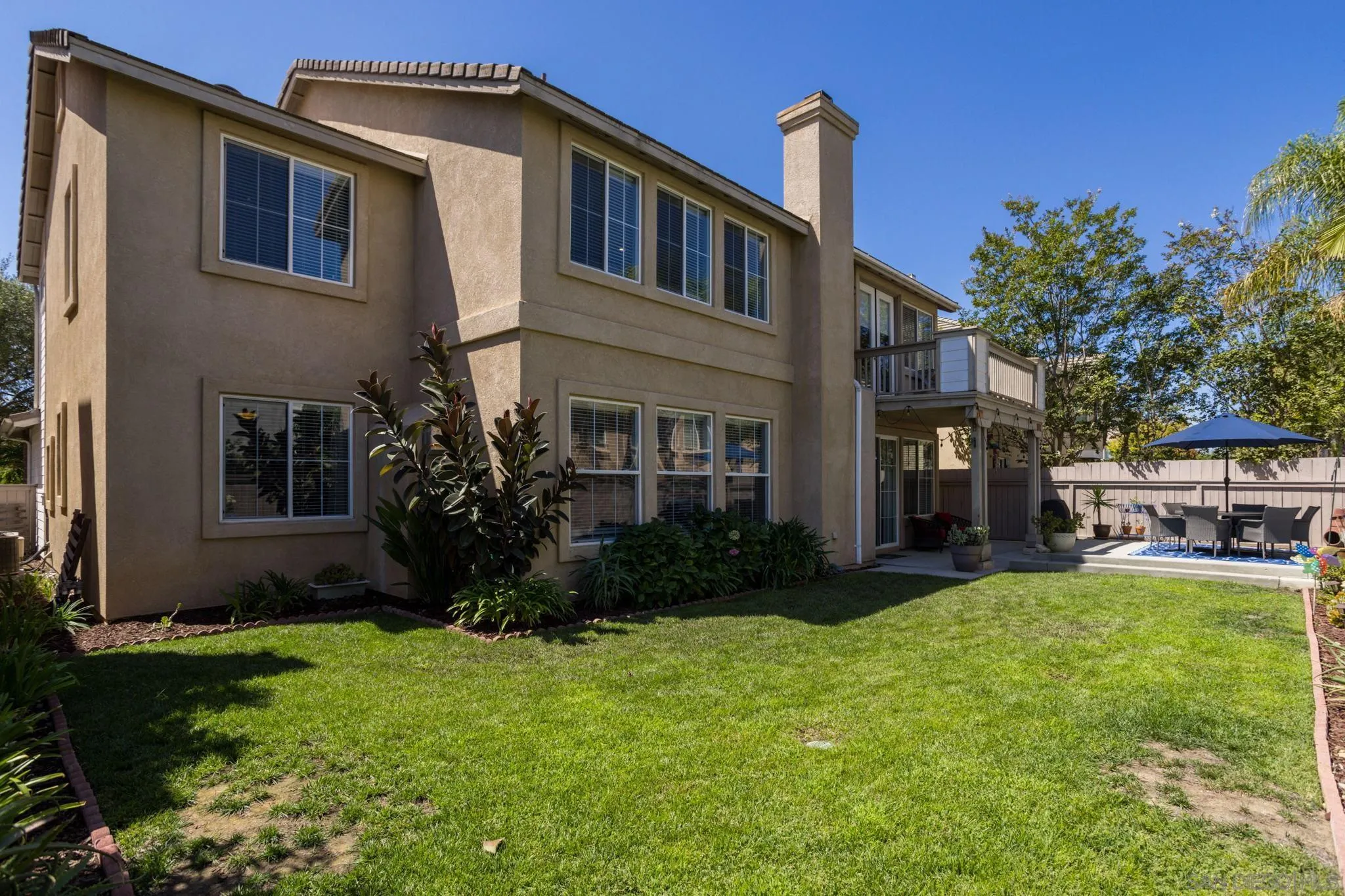 16778 Deer Ridge Road San Diego, CA 92127 - Photo 44 of 54 a view of a house with a yard and plants