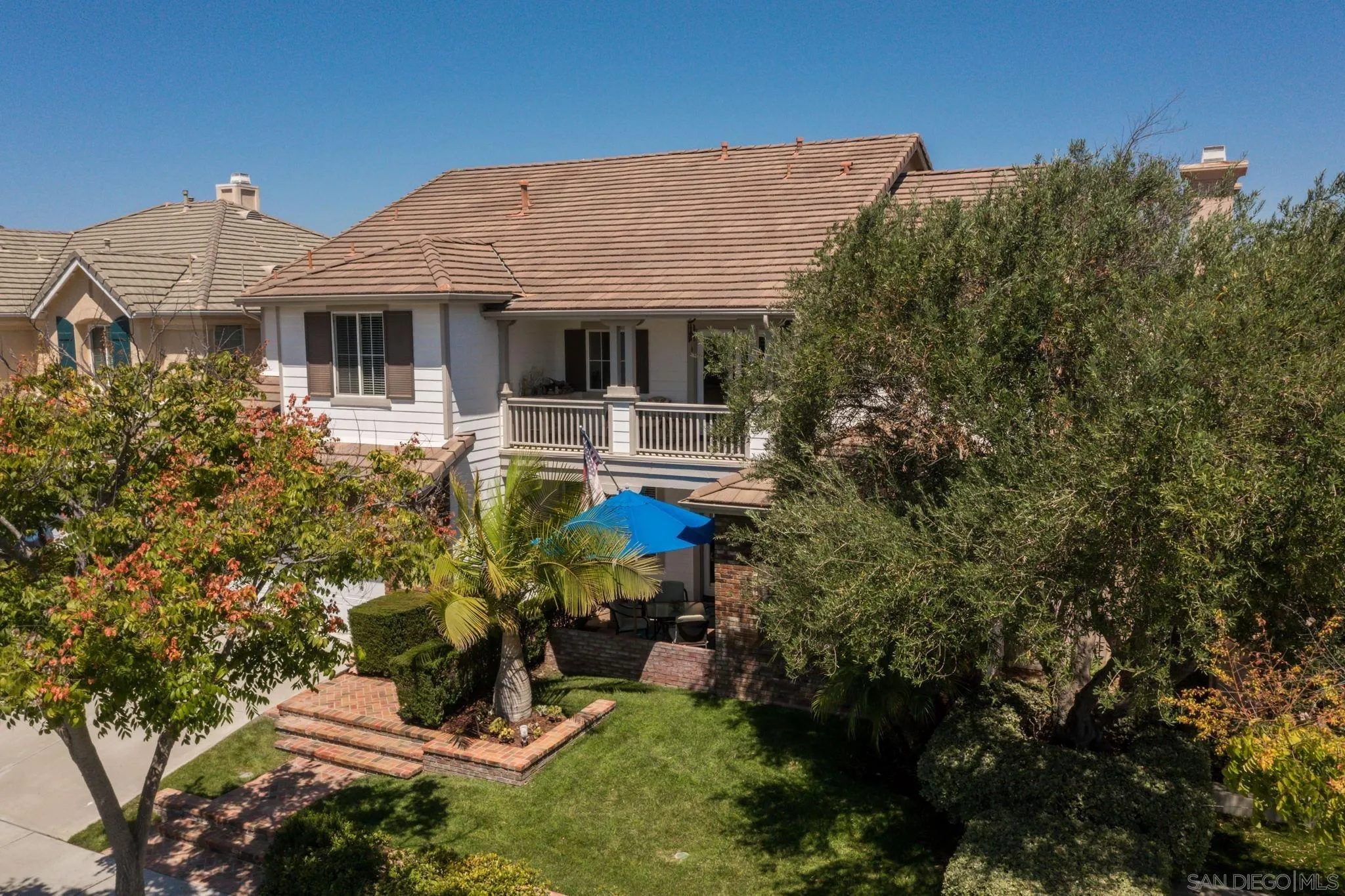 16778 Deer Ridge Road San Diego, CA 92127 - Photo 48 of 54 a front view of a house with garden