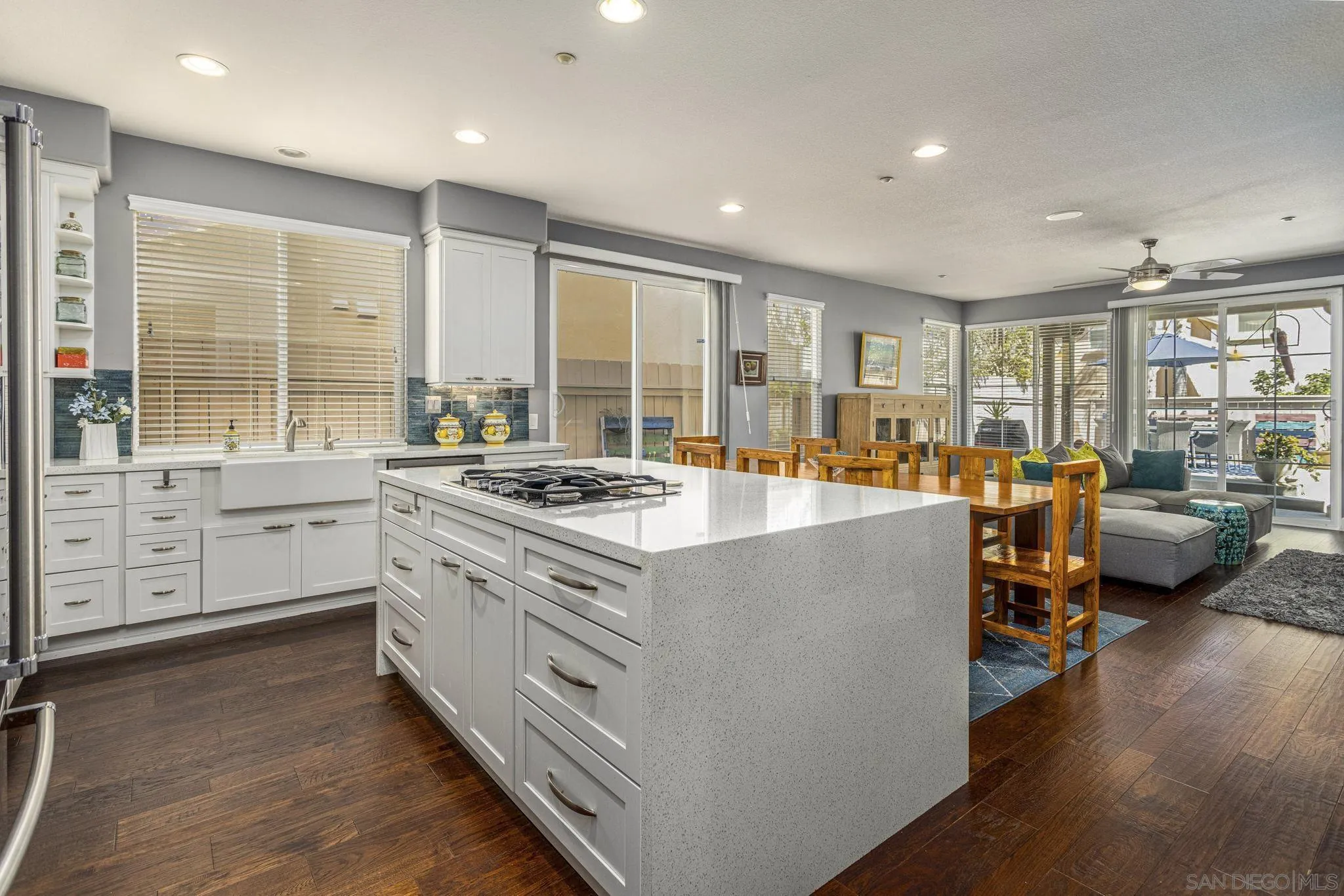 16778 Deer Ridge Road San Diego, CA 92127 - Photo 6 of 54 a large kitchen with stainless steel appliances a stove and a large window