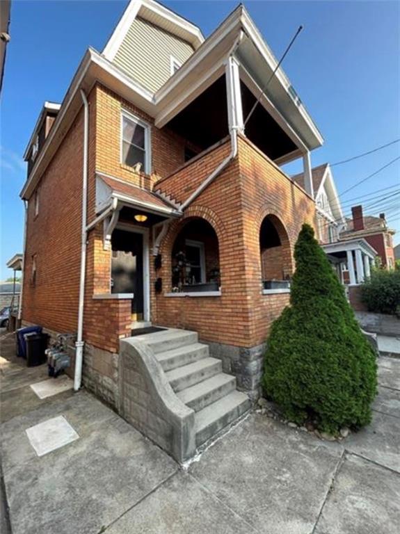 a view of a house with a patio