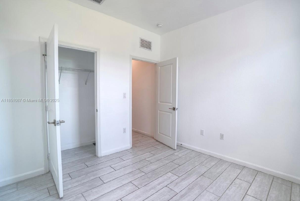 30600 Southwest 193rd Avenue Homestead, FL 33030 - Photo 12 of 36 a view of an empty room