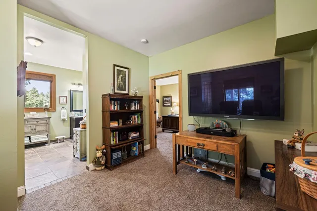 a view of a swimming pool with an outdoor seating