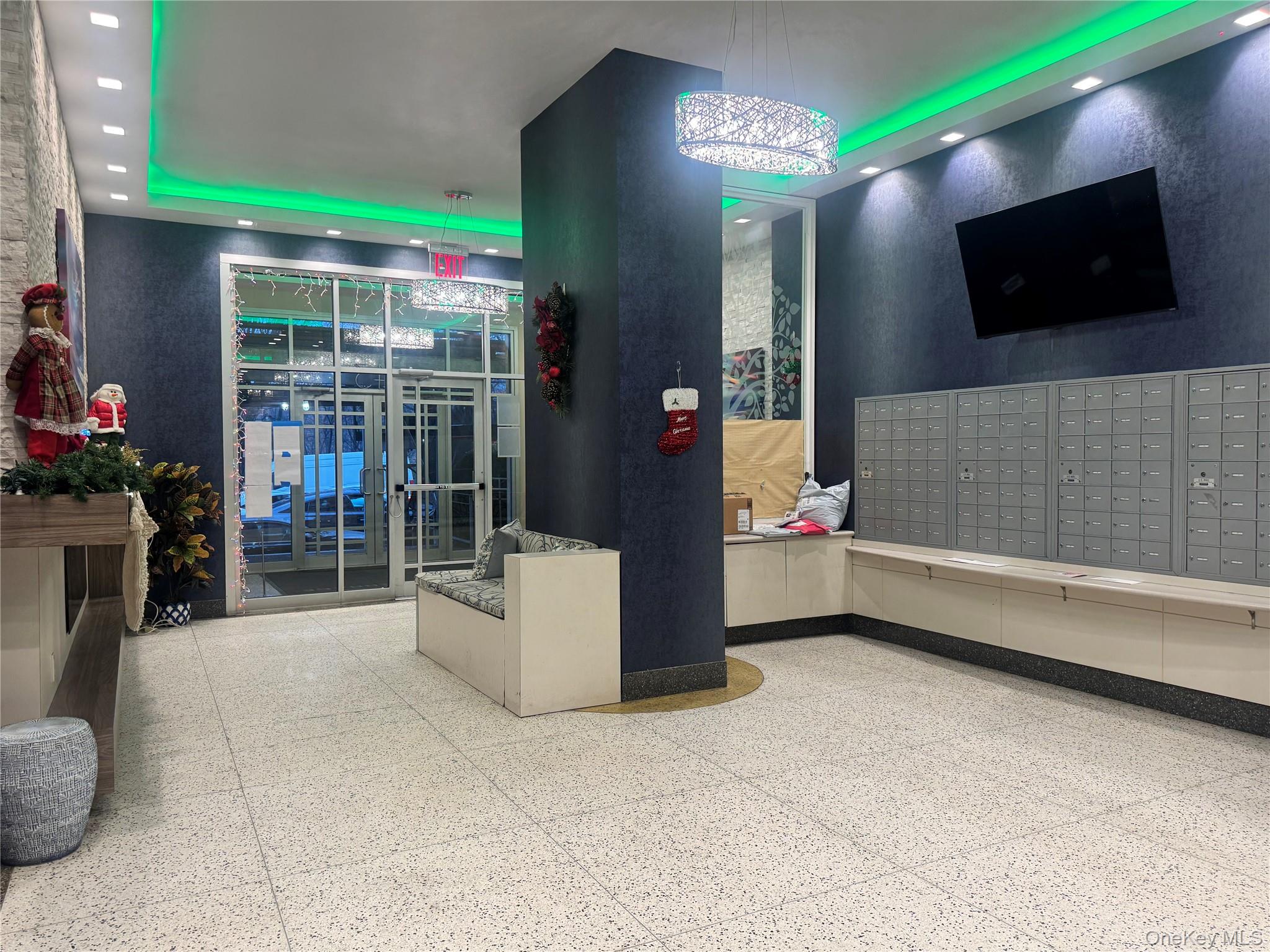 43 Bronx River Road, Unit 6C Yonkers, NY 10704 - Photo 12 of 12 a living room with a flat screen tv and a fireplace