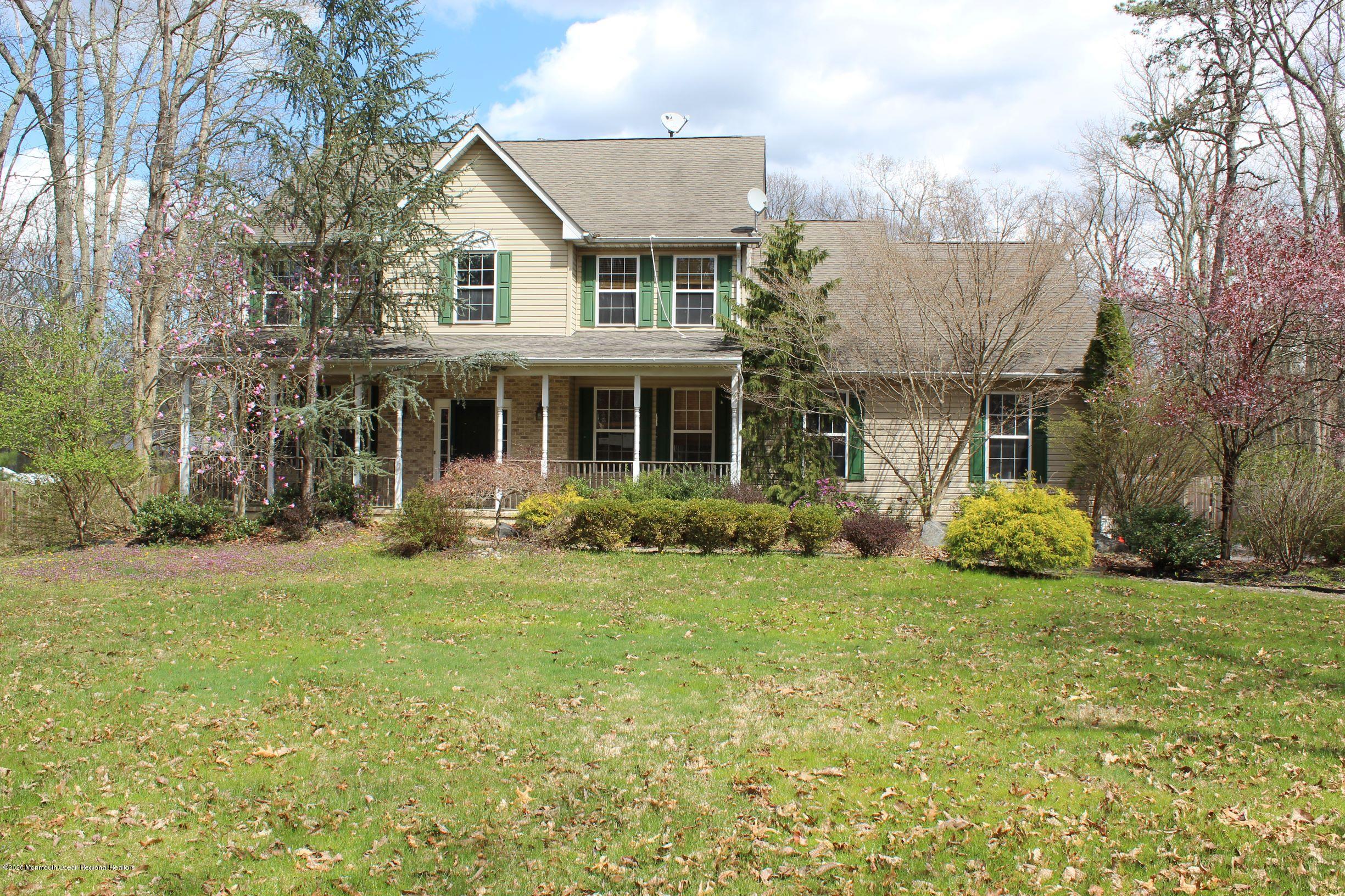 211 Cassville Road Jackson, NJ 08527 - Photo 1 of 58 a view of a house with backyard and garden