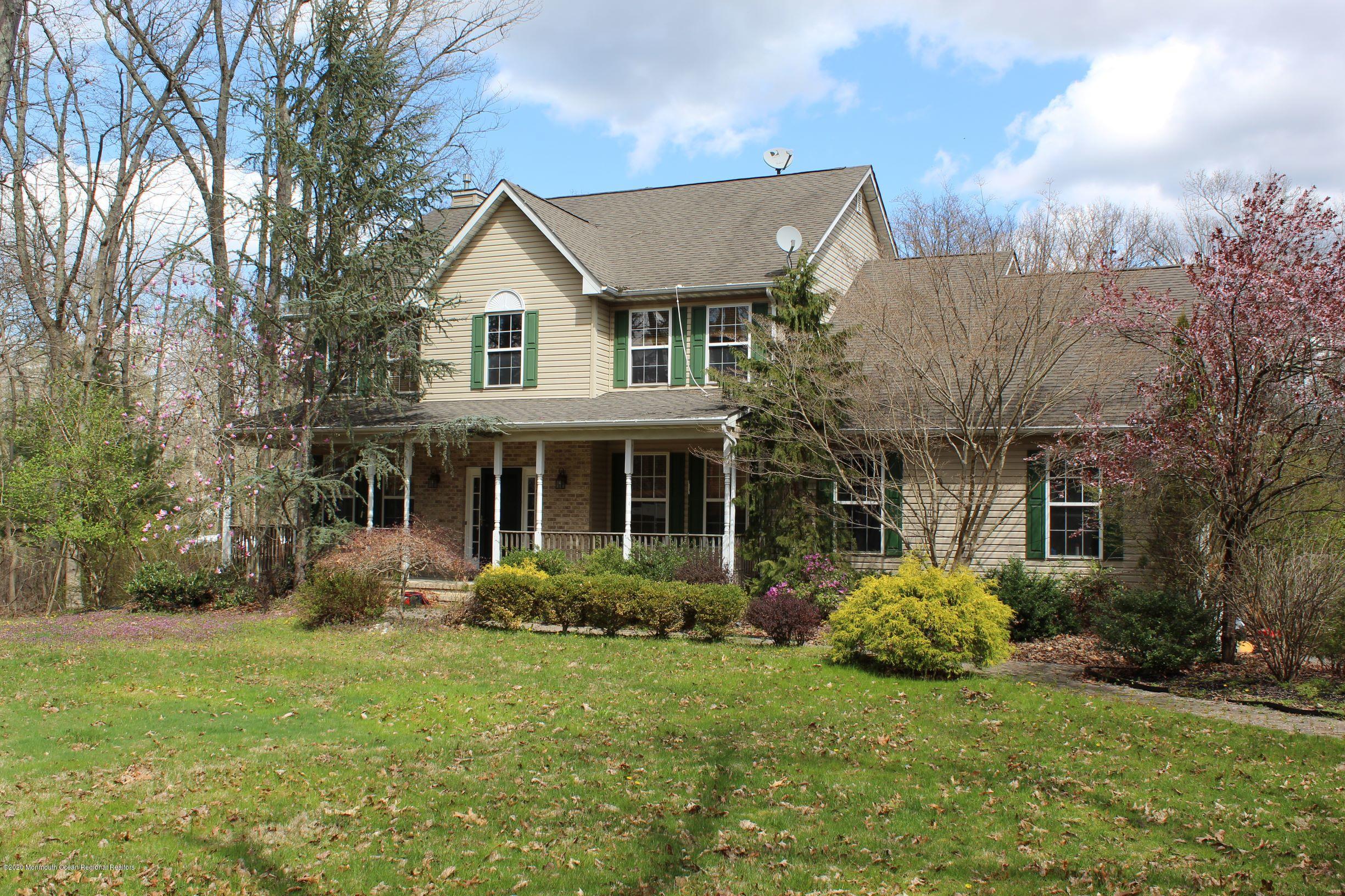 211 Cassville Road Jackson, NJ 08527 - Photo 2 of 58 a house view with a garden space
