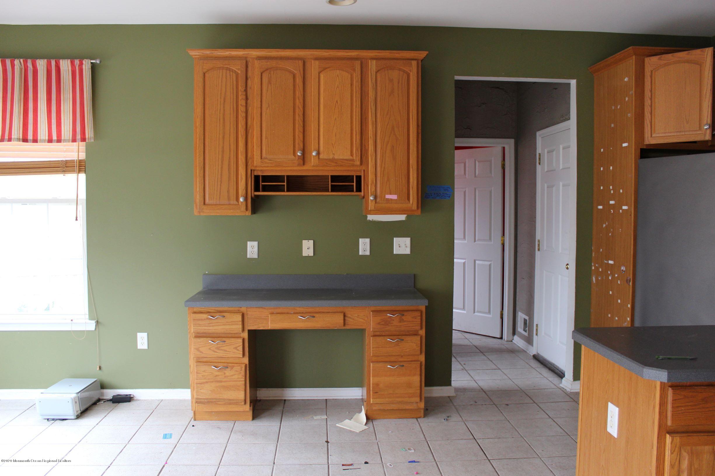 211 Cassville Road Jackson, NJ 08527 - Photo 12 of 58 a kitchen with stainless steel appliances granite countertop a refrigerator and a sink