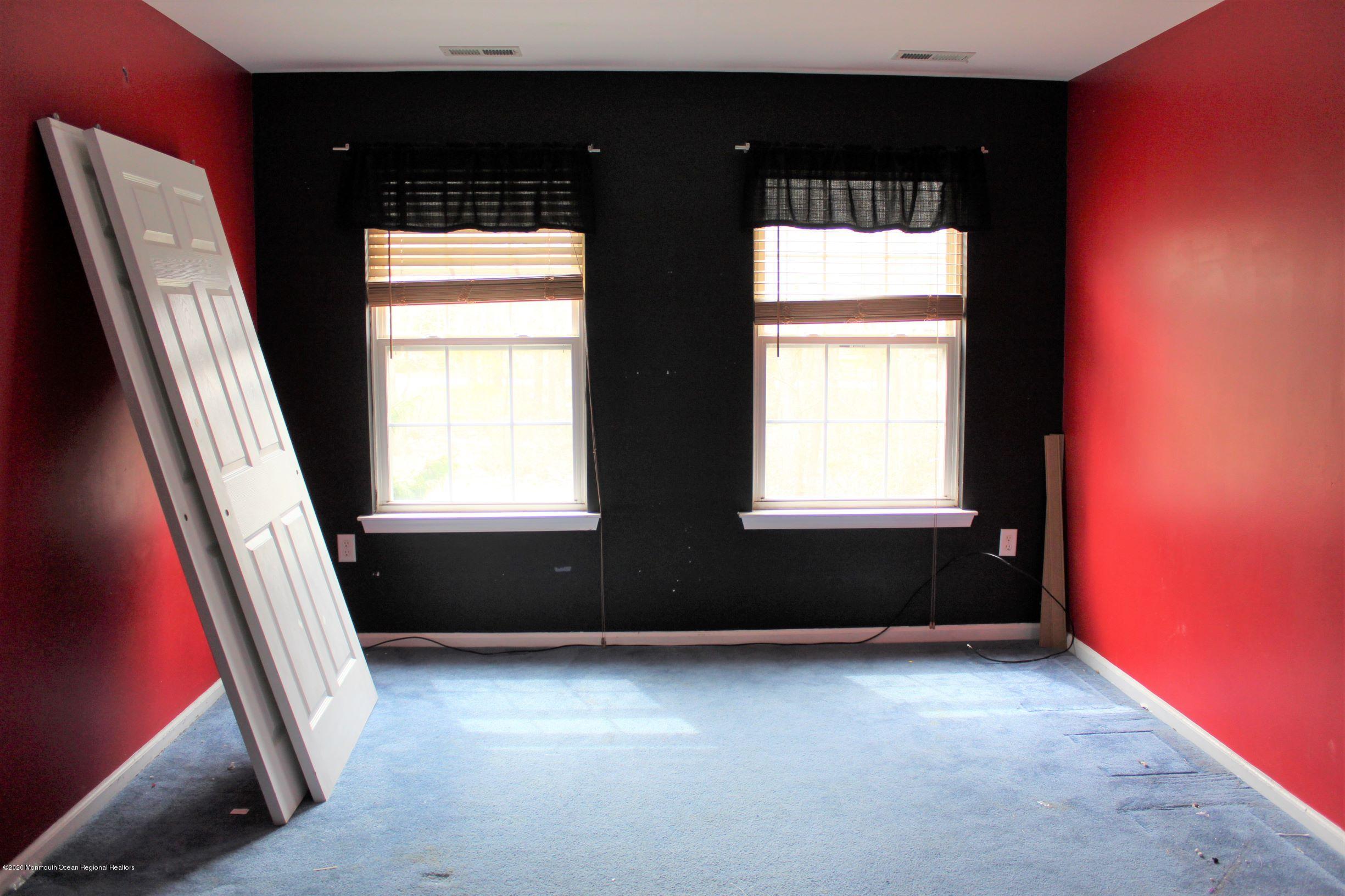211 Cassville Road Jackson, NJ 08527 - Photo 30 of 58 a view of an empty room with a window