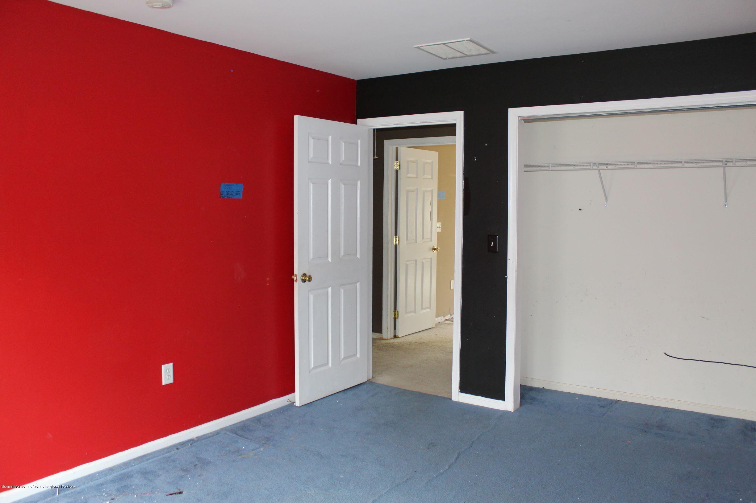 211 Cassville Road Jackson, NJ 08527 - Photo 31 of 58 an empty room with windows
